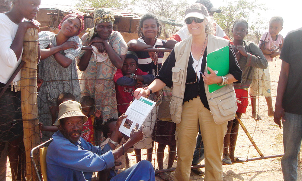 Human Wildlife Conflict education - Farmer receives education materials