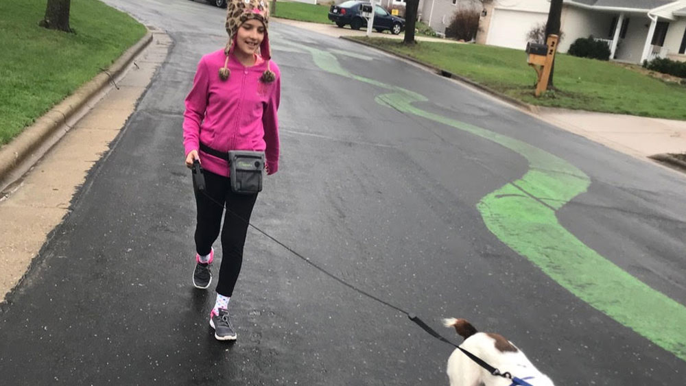 Lucy Walks Dogs for Cheetahs