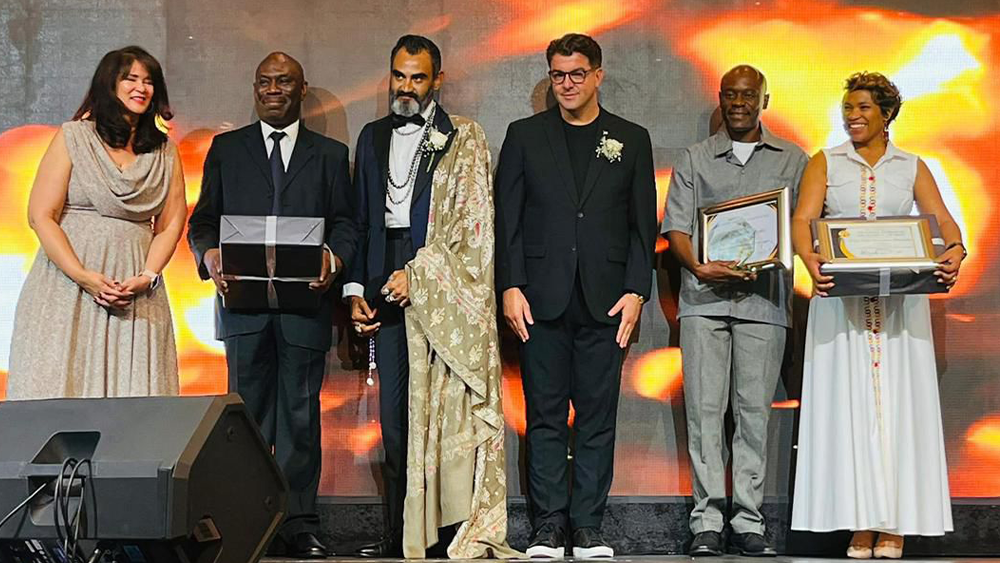 Accepting a Lifetime Achievement Award for Dr. Laurie Marker